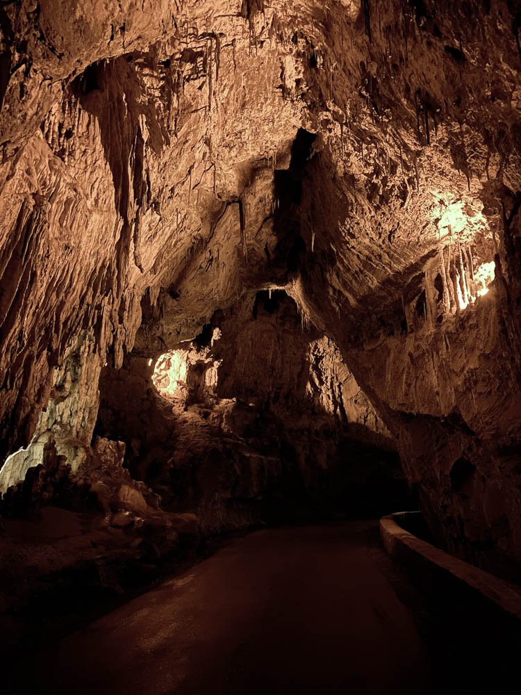 cave with stalactites and paved for cars