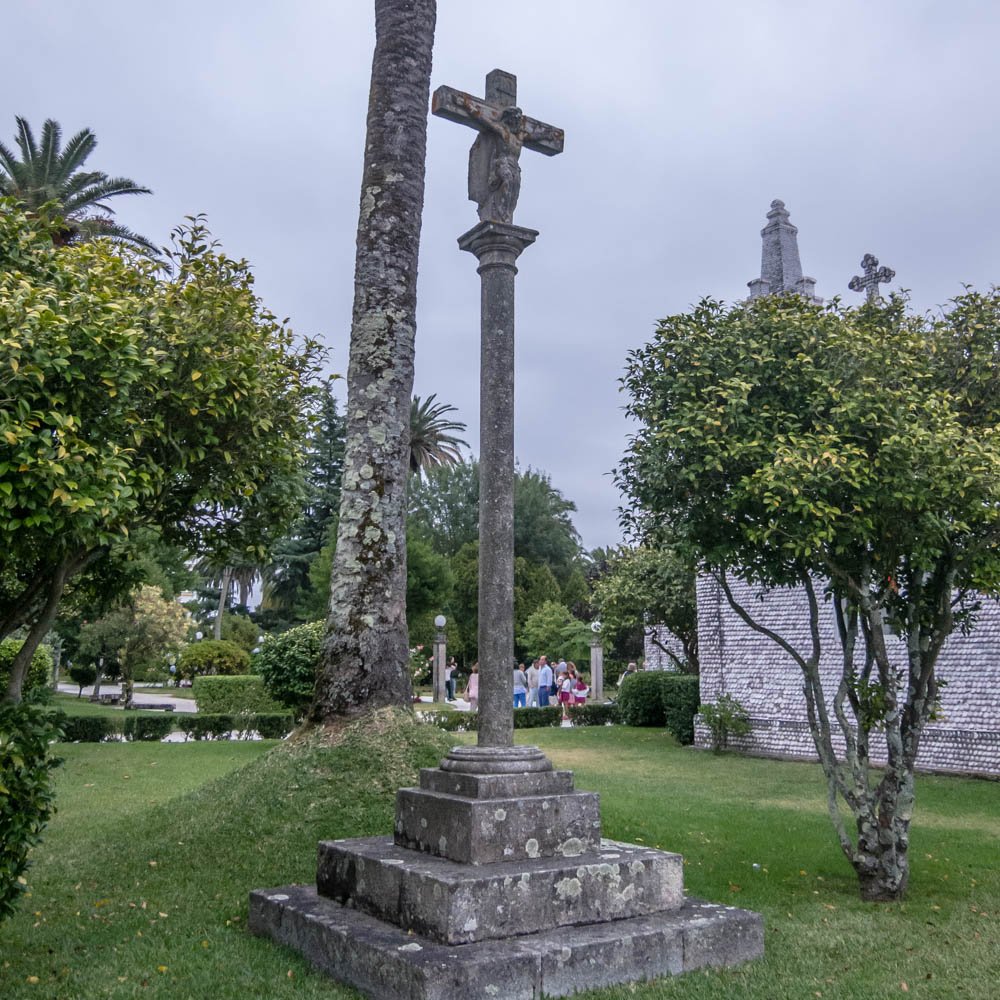 Stone cross in a garden