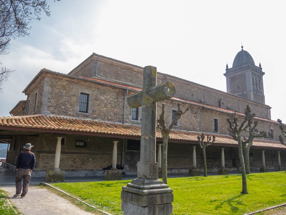 Cross and church in Luanco